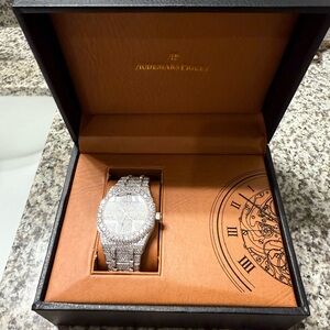 Audemars Piguet Silver Watch with Diamond Accents